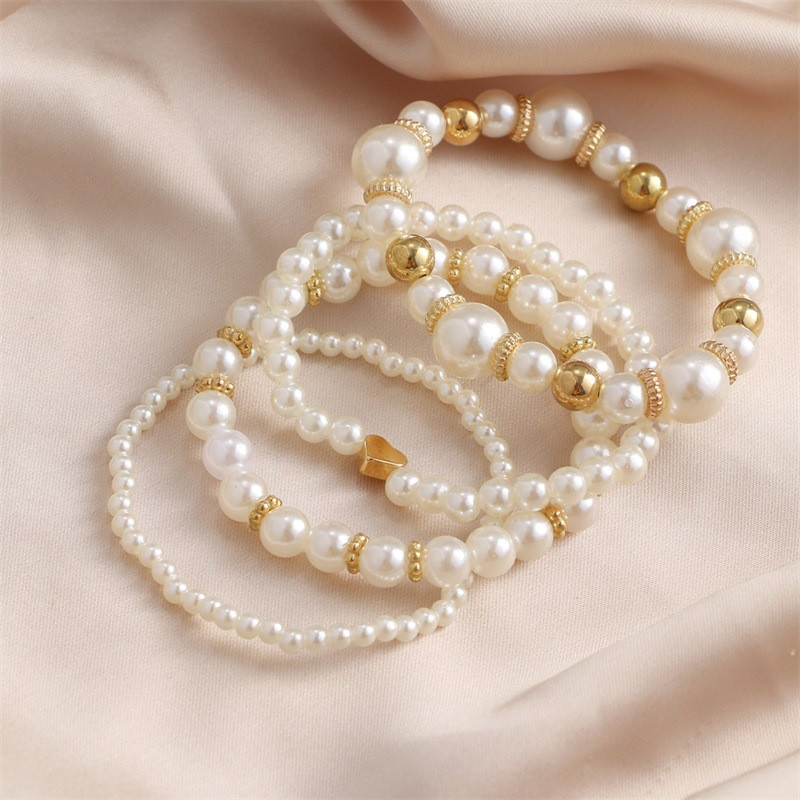 Elegant Pearl Gold Bracelet Set