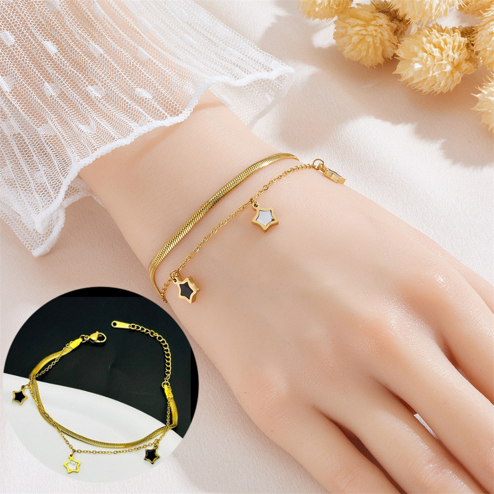 Elegant Gold Chain Bracelet with Black Charm for Women